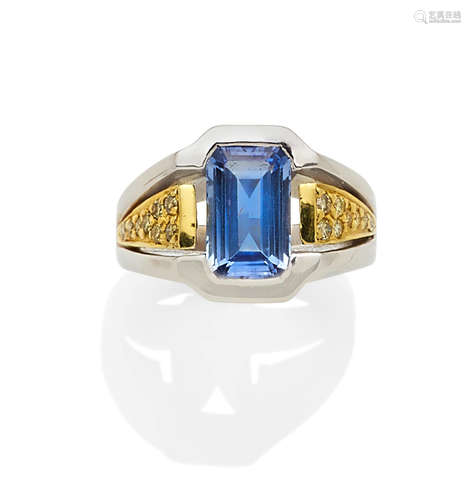 A sapphire, colored diamond and 18k bi-color gold ring