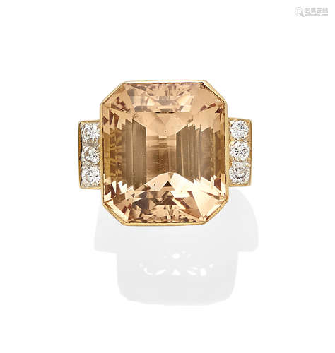 A topaz, diamond and gold ring