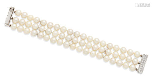 A cultured pearl, diamond and platinum bracelet