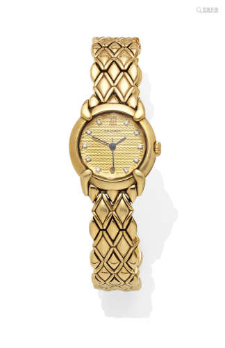 A lady's Diamond and 18k gold 'ELYSÉES' bracelet wristwatch with date, Chaumet