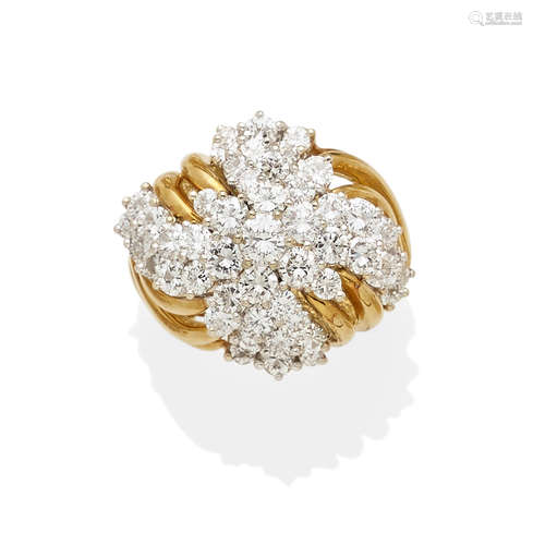 A diamond and 18K bi-color gold ring