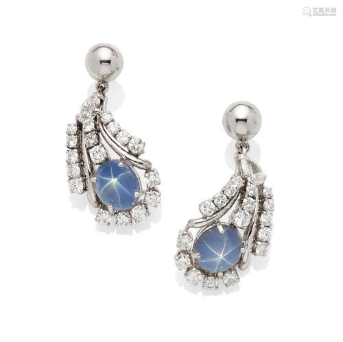A pair of star sapphire, diamond and platinum ear pendants