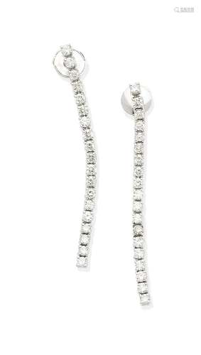 A pair of diamond pendent earrings