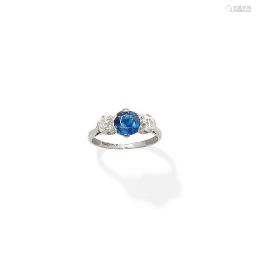 A sapphire and diamond three-stone ring