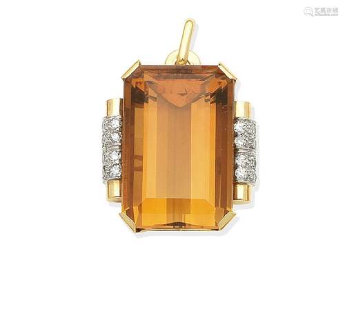 A citrine and diamond pendant