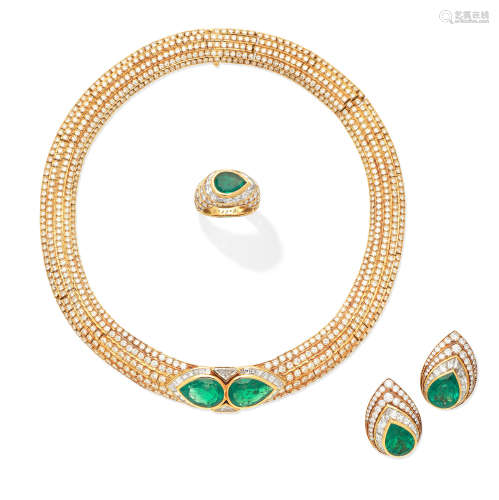 An emerald and diamond necklace, ring and earclip suite