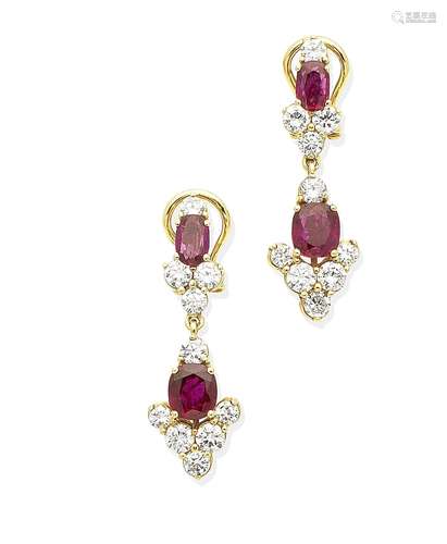 A pair of ruby and diamond pendent earrings