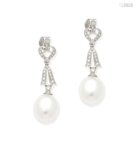 A pair of cultured pearl and diamond pendent earrings