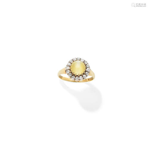 A cat's eye and diamond cluster ring
