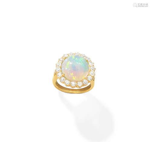 An opal and diamond cluster ring, by Tiffany