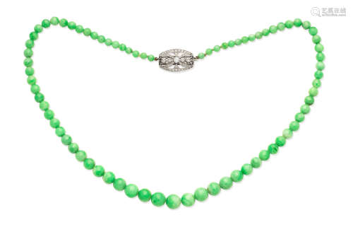 A jade necklace with a diamond clasp