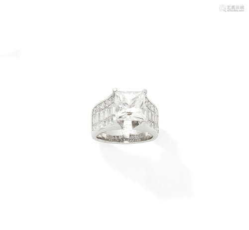 A white sapphire and diamond dress ring