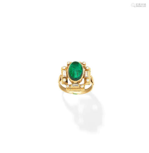 An emerald and diamond ring