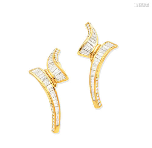 A pair of diamond earclips