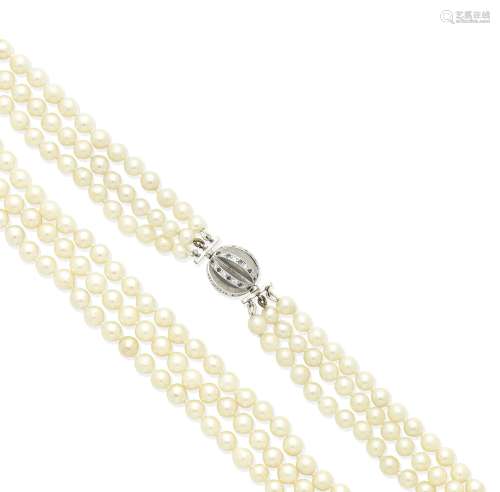 A three-strand cultured pearl and gem-set necklace, by Boodles
