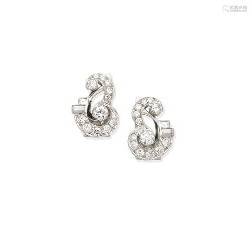 A pair of diamond earclips