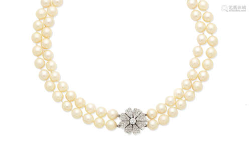 A two-strand cultured pearl necklace with a diamond clasp