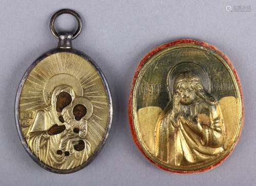 (lot of 2) Russian traveling icons, one having a silver oklad depicting the Mother of God, and
