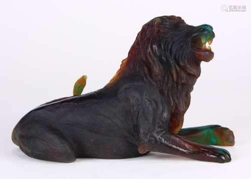 Daum France Pate De Verre African lion, depicted seated and roaring, signed on base Daum France,