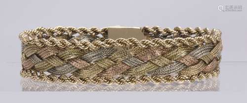 14k tri-color bracelet The 14k yellow, white and rose gold woven and braided link, measures