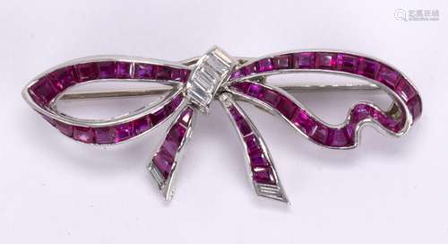 Ruby, diamond, platinum and 18k white gold bow brooch Designed as an articulated bow, measuring