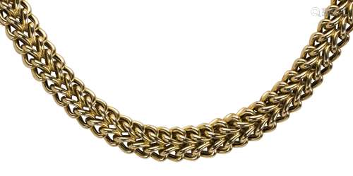 18k yellow gold necklace The 18k yellow gold woven link, measures approximately 10 mm, completed