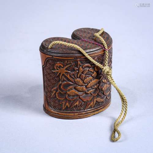 Japanese tonkotsu tobacco box, 19th century, bamboo carved with peony, the lid with a woven pattern,