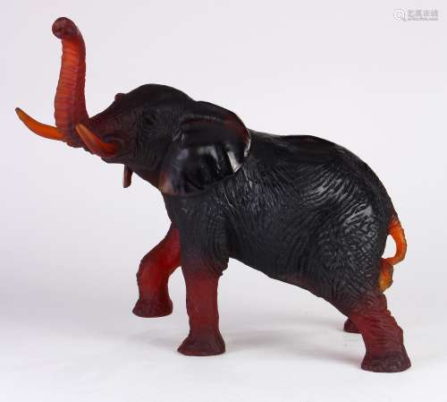 Jean-Francois Leroy for Daum France, art glass Pate De Verre amber elephant with raised trunk, 12.