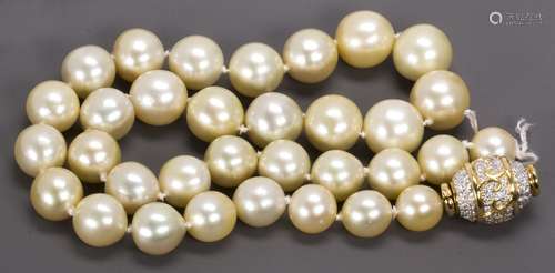 South Sea cultured pearl, diamond and 18k yellow gold necklace Composed of (35) South Sea cultured