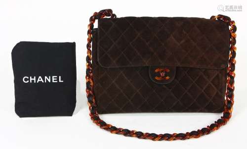 Chanel maxi single suede handbag, executed in brown with a quilted pattern, having tortoise shell