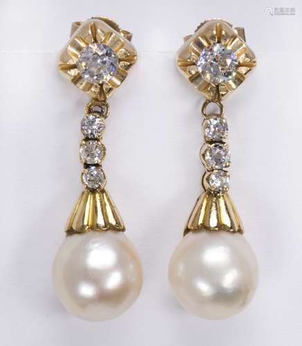 Pair of cultured pearl, diamond and 14k yellow gold earrings Featuring (2) baroque, 9 mm, cultured