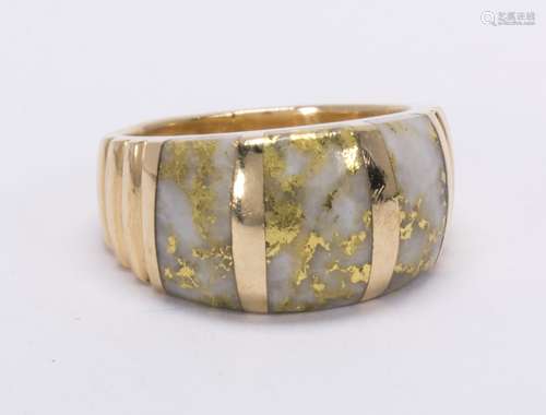 Gold-in-quartz and 14k yellow gold ring Featuring (3) gold-in-quartz inlaid wedges, measuring