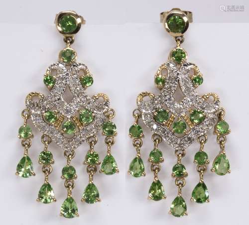 Pair of garnet, diamond and 10k yellow gold chandelier earrings Featuring (24) round-cut and (10)