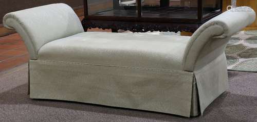 Custom Moderne chaise lounge, having beige upholstery, above a matching skirt, 28