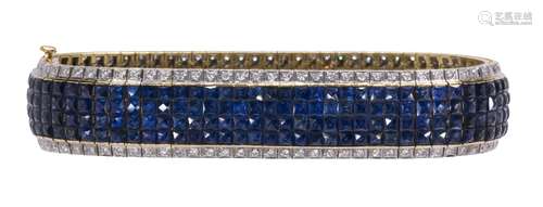 Sapphire, diamond and 18k yellow gold bracelet Featuring (300) French-cut sapphires, weighing a