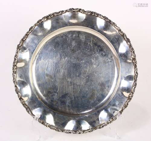 Mexican sterling silver salver, having a ruffled edge, the rim accented with leaf and scroll work,