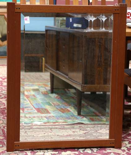 Berkeley Mills Arts and Crafts style mirror, having a paneled mahogany frame surrounding the beveled