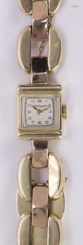 Lady's Retro Jules Jurgensen 14k yellow gold wristwatch Dial: square, textured, raised gold tone,