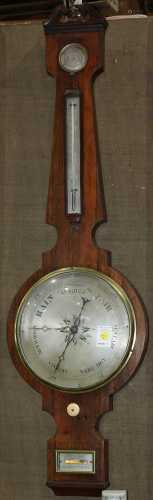 Chippendale barometer, having a rosewood case with four windows, and retailers mark J. Tresoldi,