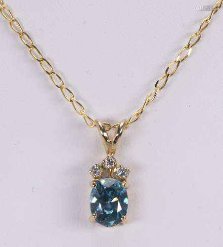 Zircon, diamond and 18k yellow gold pendant-necklace Featuring (1) oval-cut blue zircon, weighing