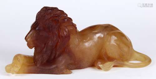 Daum France Pate De Verre limited edition lion, executed in amber, depicted seated in recumbent