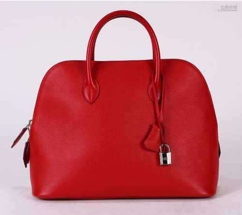 Hermes bolide swift web handbag, executed in red, 31cm, with rain jacket, lock, clochette, and