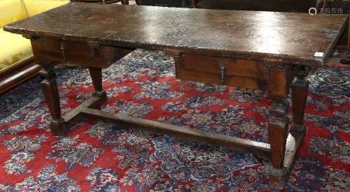 Spanish Baroque work table, 18th century, the plank top surmounting two drawers, and rising on