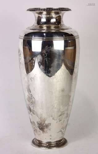 Tiffany & Co. sterling silver vase, having a tapering ovoid form, the lip with gadrooning detail,