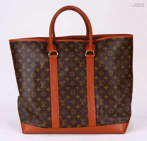 Vintage Louis Vuitton monogram tote, having two outer side pockets, interior zipper pocket, marked