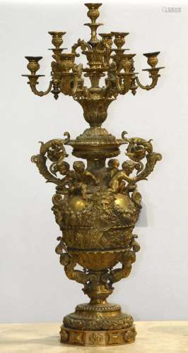 Large Louis XV style gilt bronze candelabra, having ten lights, accented with figural animal mounts,