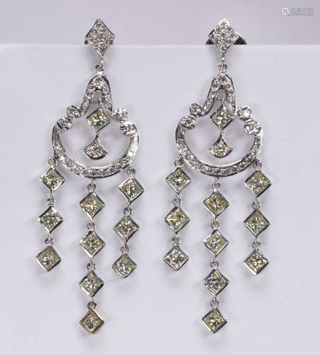 Pair of diamond and 18k white gold chandelier earrings Featuring (22) princess-cut diamonds,