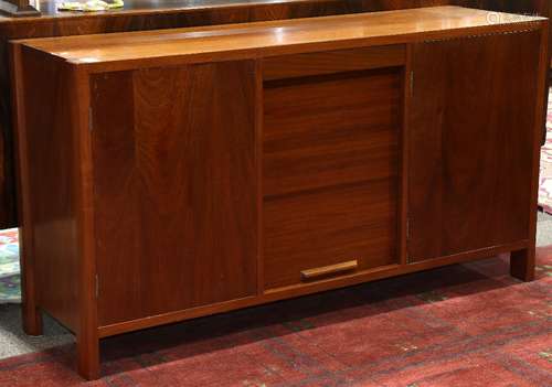 Scandinavian teak credenza, circa 1970, having an inlaid top, above the case with a tambour door