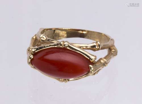 Coral and 14k yellow gold ring Featuring (1) navette-shaped coral cabochon, measuring