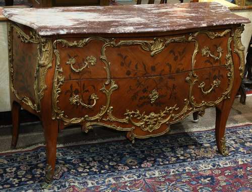 Louis XV style commode, having a shaped marble top, above the two drawer inlaid case, with ormolu